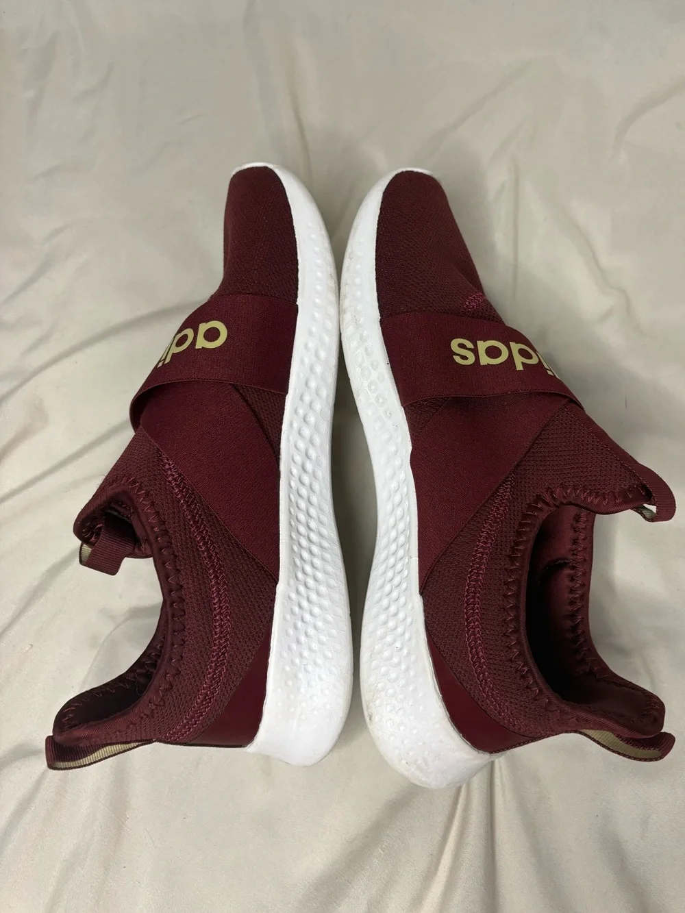 adidas woman’s burgundy sneakers